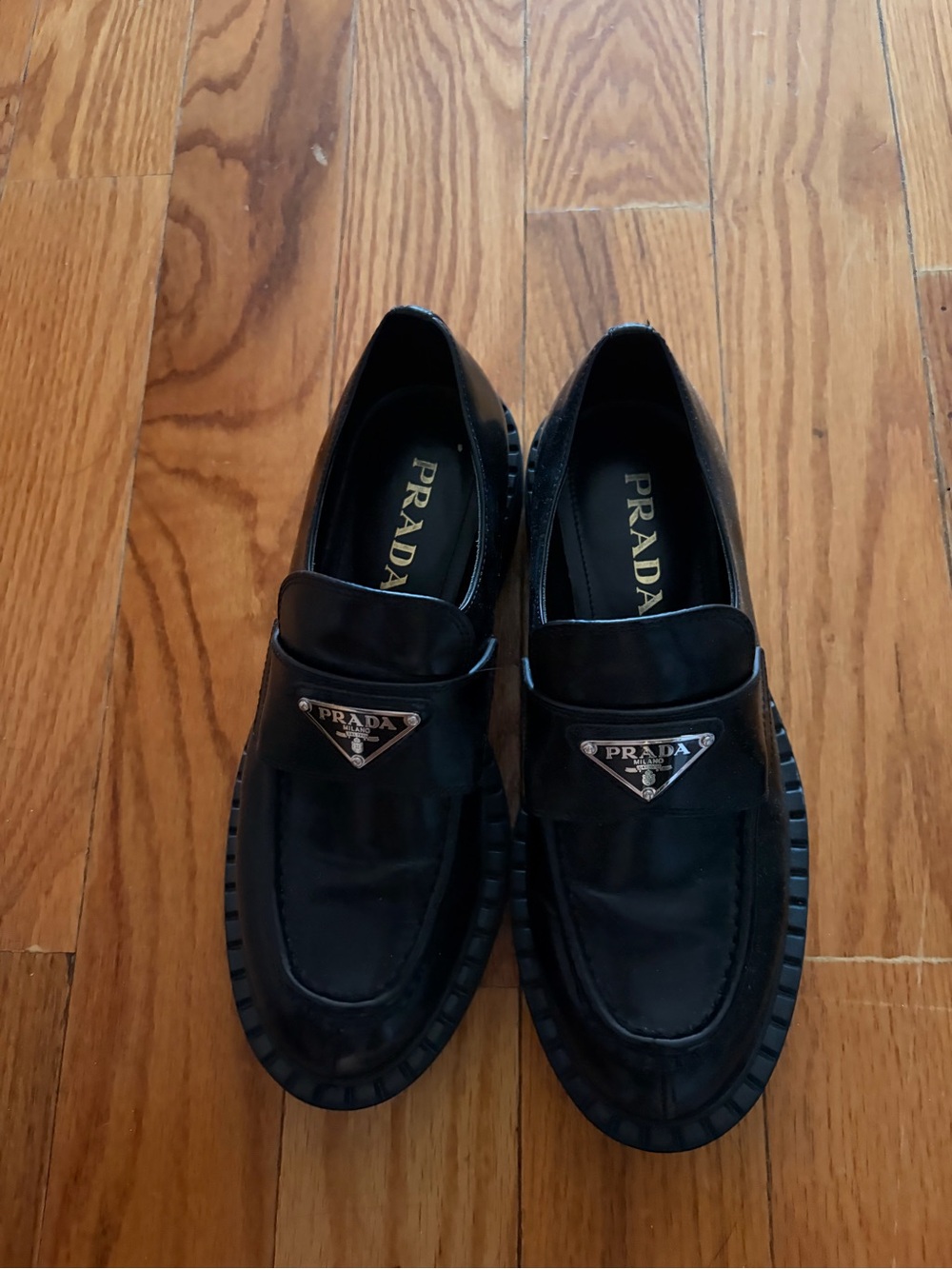 SIMILAR TO Prada Black Leather Loafers